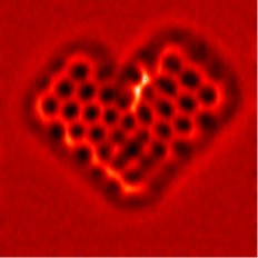 Constant height frequency shift images of a porphirinoid molecure on Au(111).